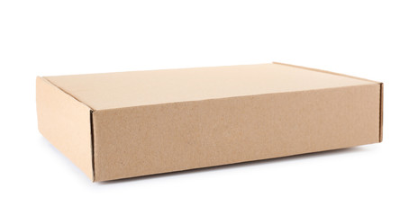 Closed cardboard box on white background. Mockup for design