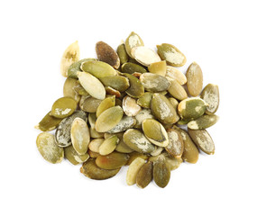 Pile of raw pumpkin seeds on white background, top view