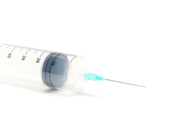 Medical syringe with a needle isolated on white background. Disposable syringe with a capacity of 60 ml.