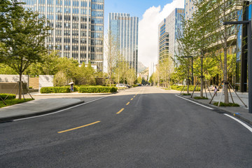 Obraz premium empty highway with cityscape and skyline of qingdao,China.