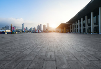 Empty square ground and modern buildings in Qingdao, China