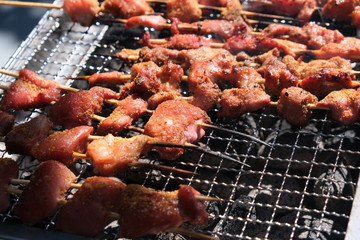 barbecue sticks on a hibachi grill