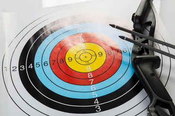 Bow and arrows with bulls eye target