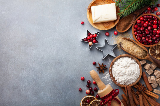 christmas cookies with cinnamon and anise on wooden background