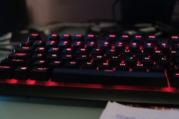 black keyboard with red lights (qwerty)