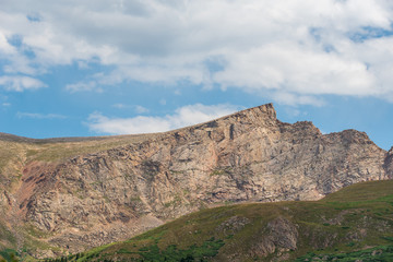 Guanella Pass landscape of distant stone mountain peak at high elevation in Colorado