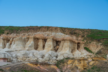 Low angle landscape of strange rock formations at Interpretive Paint Mines in Colorado