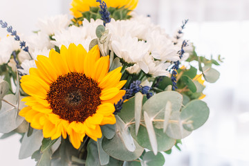 Close up of Lavander,sunflowers, and white chrysanthemums.