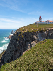 Fototapeta na wymiar Portugal, may 2019: Cabo da Roca Lighthouse. Cabo da Roca is the most westerly point of the Europe mainland, Sintra