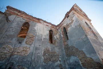 Old ruined abandoned roman catholic church in Izyaslav