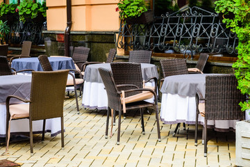 Chairs and tables in a cozy street cafe