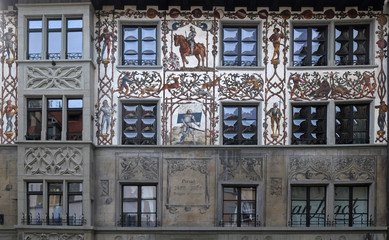 Fototapeta na wymiar Painted house facade commemorating Battle of Dornach on Hirschenplatz in Old Town of Lucerne, Switzerland