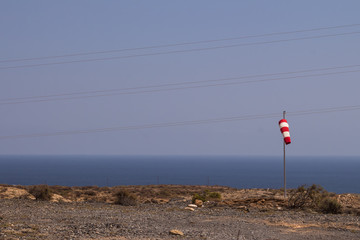Windsock on the coast of Atlantic ocean, Tenerife, Spain