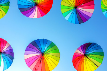 colorful umbrellas against the blue sky