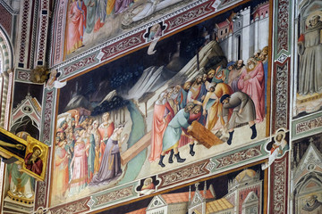 The tree grew and was made into a bridge, in front of which the Queen of Sheba kneels, then Solomon has the wood removed and sinks it, fresco by Agnolo Gaddi in Basilica di Santa Croce in Florence