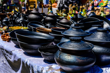 Different clay utensil for sale on a country fair
