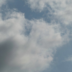 Natural blue sky with fluffy clouds.