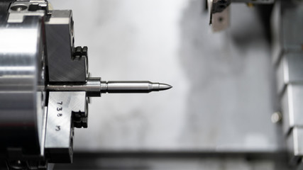 Steel metal automotive parts cutting machine process by CNC lathe in the factory