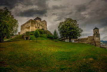 The inner Gothic castle in Trencin Slovakia with Renaissance palace and castle gate dramatic stormy sky