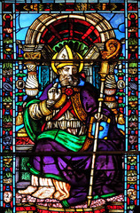 Stained glass window in the Santi Paolino e Donato church in Lucca, Tuscany, Italy 