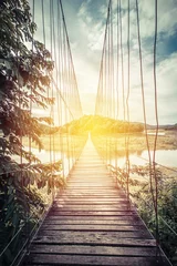 Rolgordijnen Wooden bridge over lake. Vintage filter © pushish images