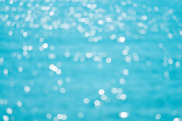 Blur and bokeh sun light reflect on sea surface