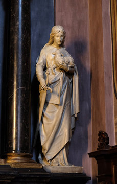 Saint Agnes of Rome statue on the altar in the St Nicholas Cathedral in Ljubljana, Slovenia