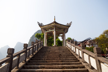 Fototapeta premium Chinese style stone staircase and pagoda