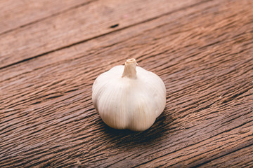Organic garlic  on wooden background