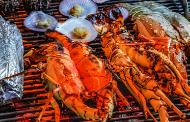 Lobster grilling barbecue on aluminum foil