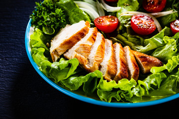 Caesar salad on stone table