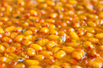 Fresh sea buckthorn jam. Close-up. Background. Texture.