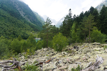Fototapeta na wymiar Mountain landscape, lake and mountain range. Dombay, northern caucasus, raw original