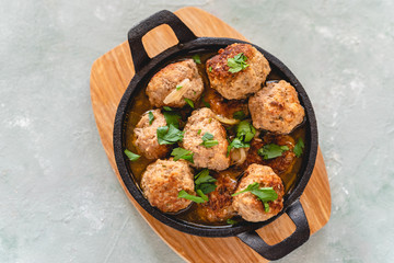 Homemade pork and beef meatballs in gravy