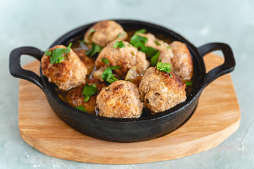 Homemade pork and beef meatballs in gravy