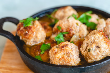 Homemade pork and beef meatballs in gravy