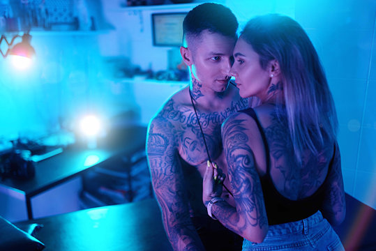 The guy and the girl in tattoos are love