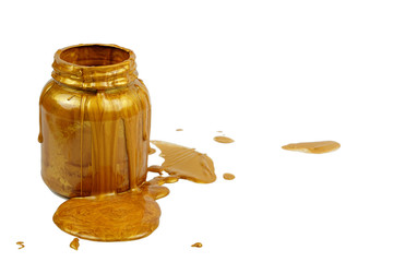 Pouring golden paint on the can