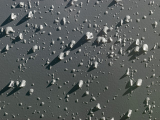 abstract close-up view of water and hail on white background, suitable for textures