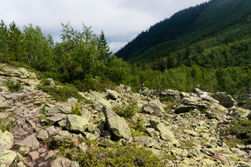 Fototapeta na wymiar Mountain landscape, lake and mountain range. Dombay, northern caucasus, raw original