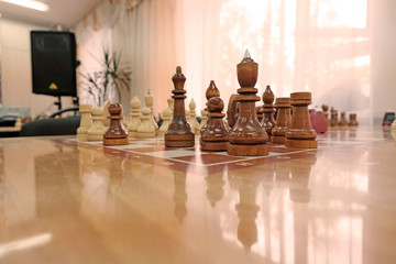 Chess pieces are placed on the Board. Preparation for the tournament, competitions. The concept of sports equipment intellectual