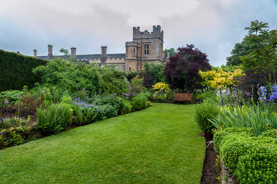 SUDELEY CASTLE, WINCHCOMBE, GLOUCESTERSHIRE, ENGLAND - MAY, 26 2018: 16th century Sudeley Castle and its gardens in Winchcombe, Gloucestershire, Cotswolds, England