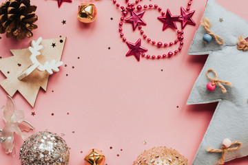  frame of christmas toys on a pink background. Christmas tree. Space for text