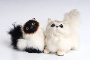 Plush cat toy on a white background