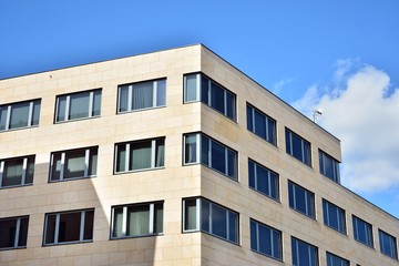 The windows of a modern building for offices. Business buildings architecture.