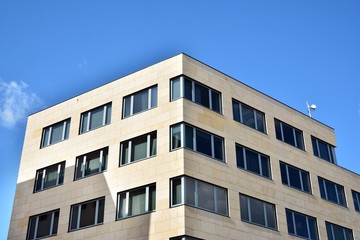 The windows of a modern building for offices. Business buildings architecture.