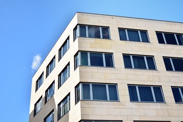 The windows of a modern building for offices. Business buildings architecture.