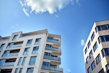 Fototapeta premium Modern European residential apartment buildings quarter. Abstract architecture, fragment of modern urban geometry.