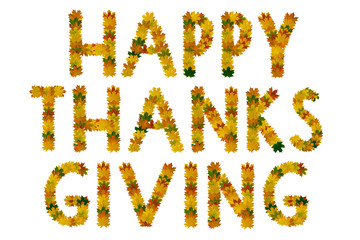Phrase Happy thanks giving of yellow, green and orange maple autumn leaves close-up. Isolate on white background