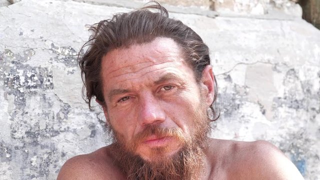 Beggar on the street. Real person with no fixed abode, homeless man